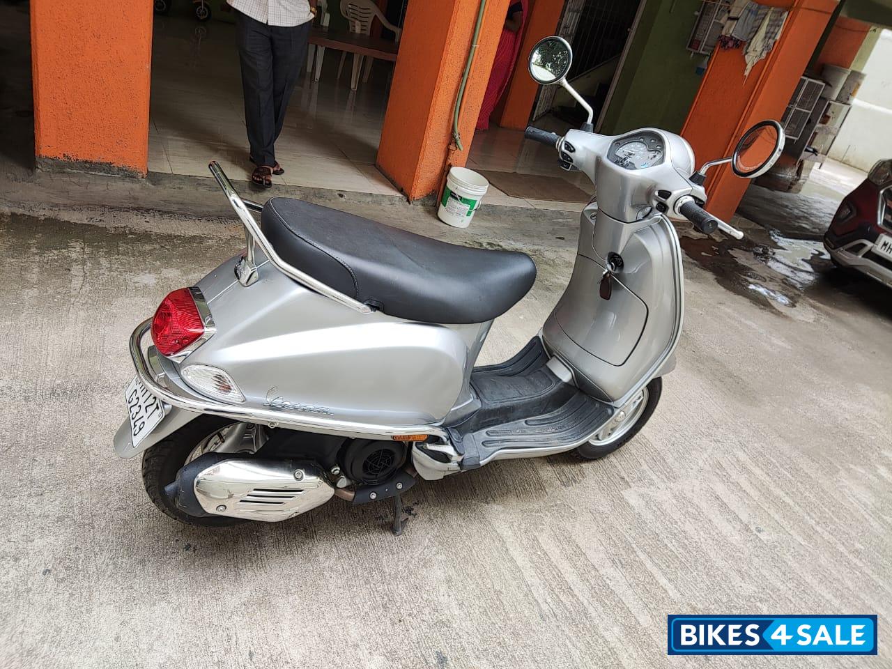 Silver Vespa VX 125