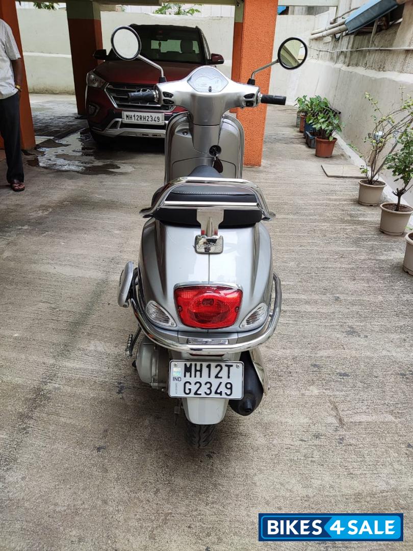 Silver Vespa VX 125