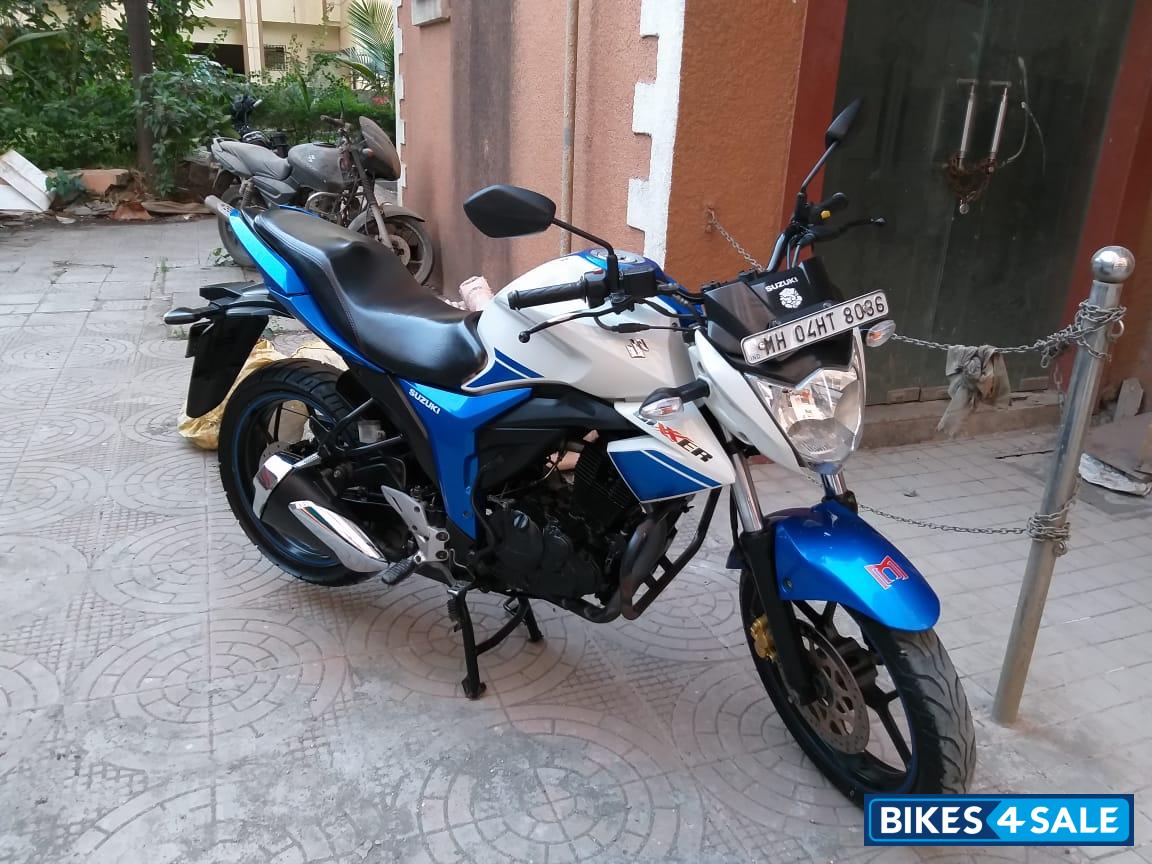 White And Blue Suzuki Gixxer 150