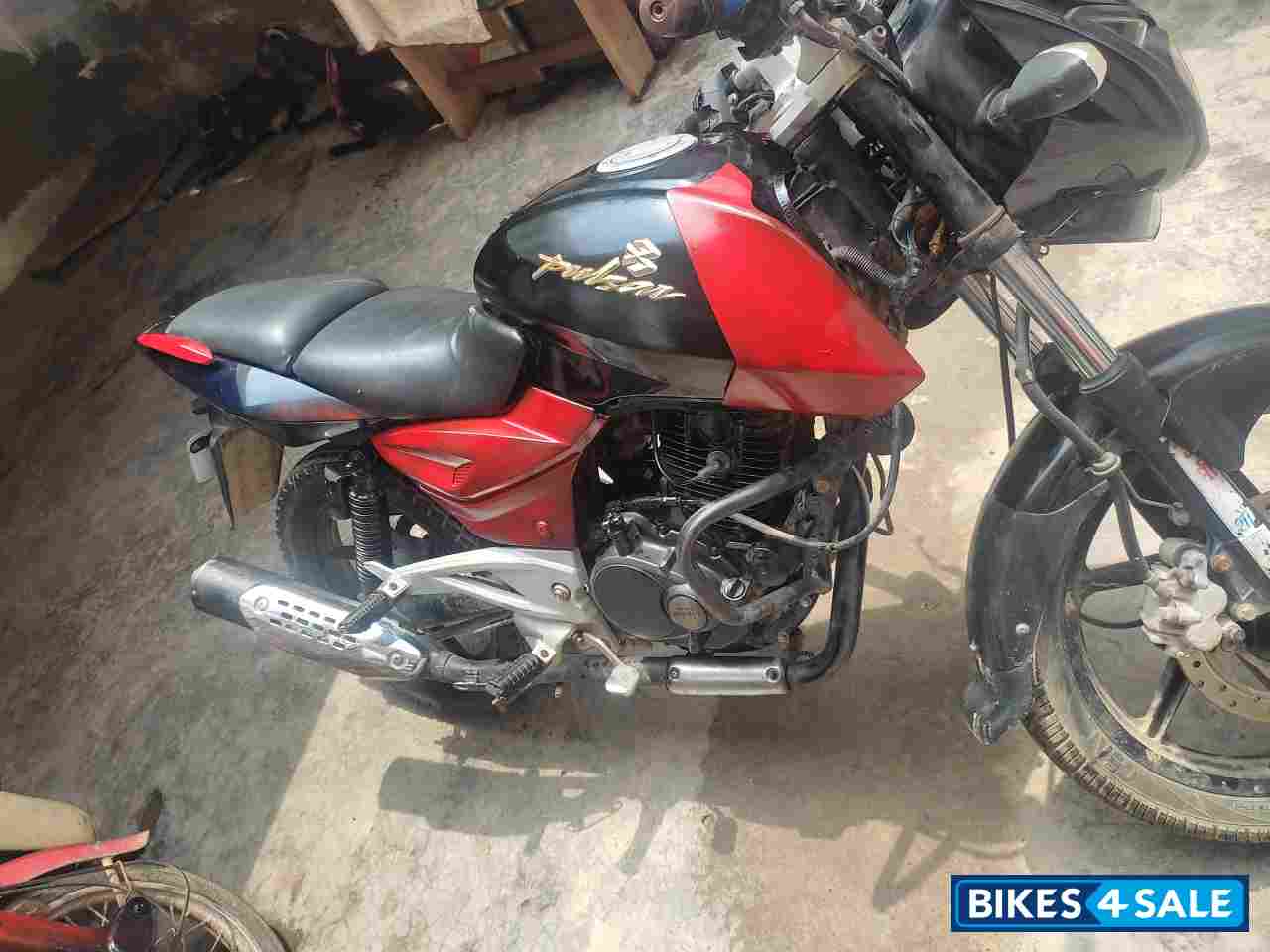 Red And Black Bajaj Pulsar 180