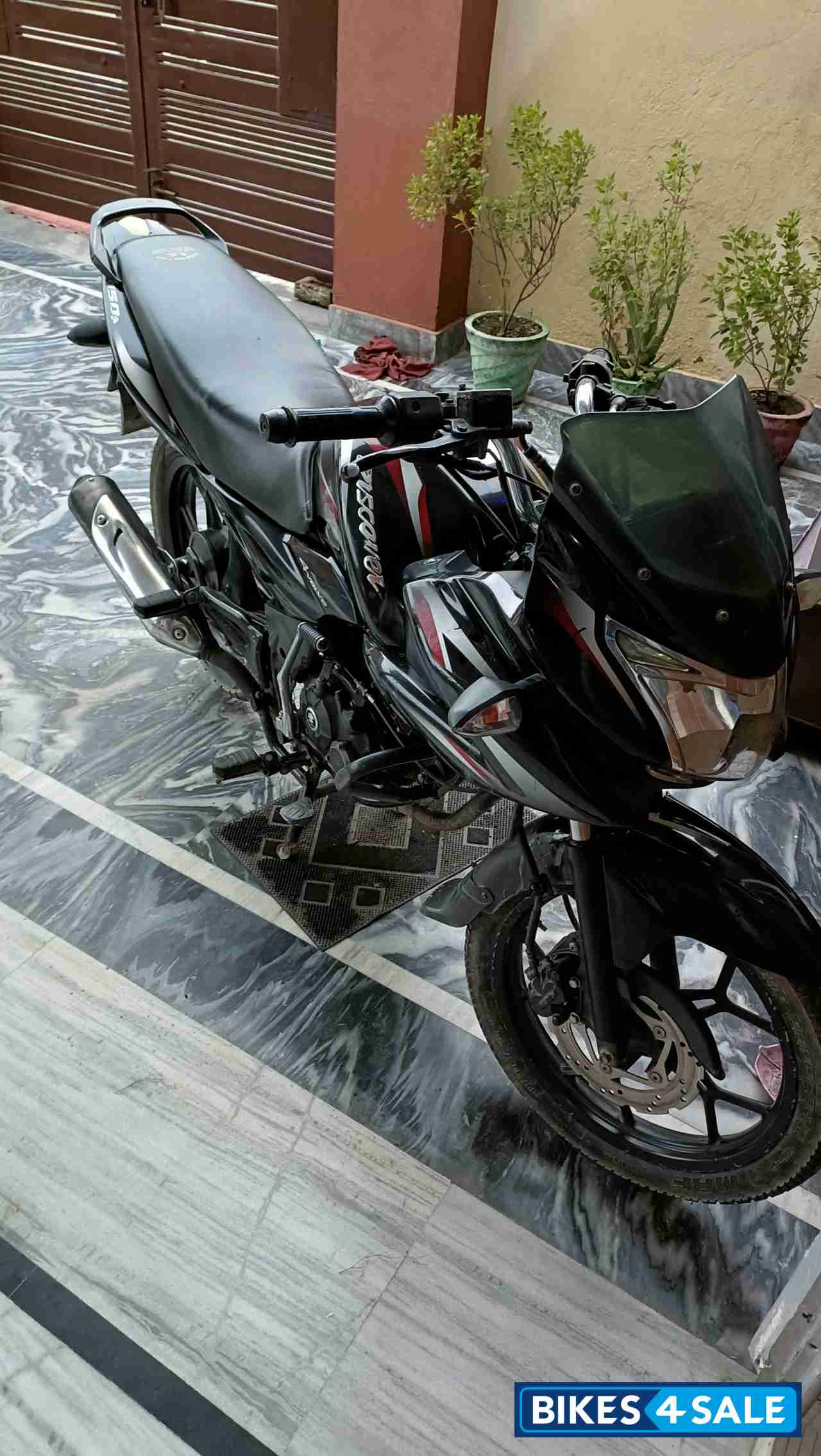 Red And Black Bajaj Discover 150 F