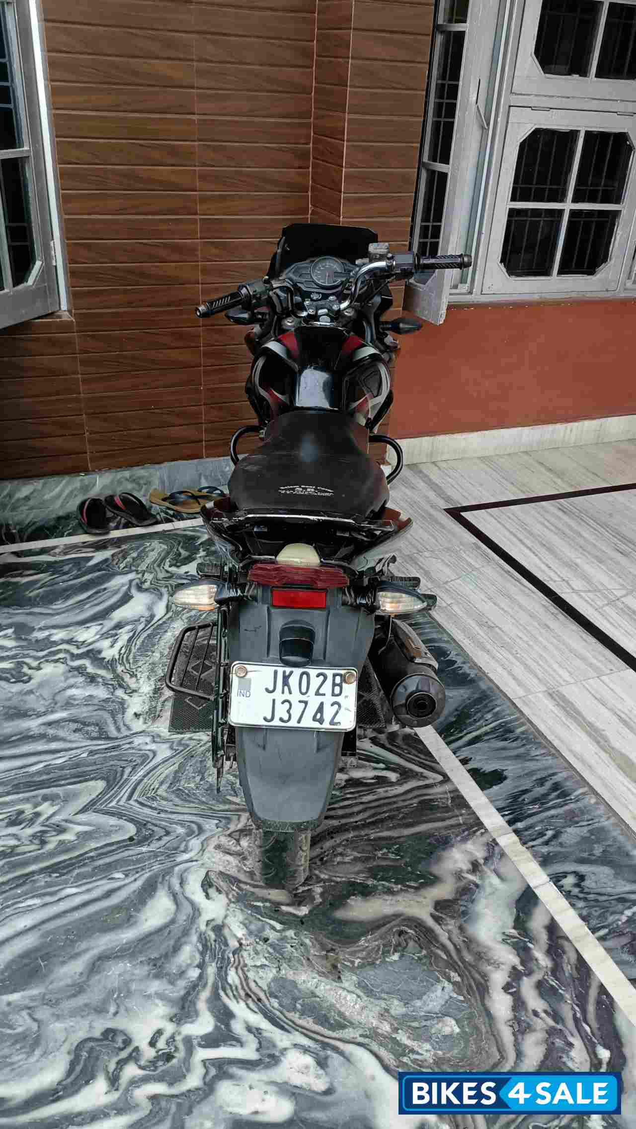 Red And Black Bajaj Discover 150 F