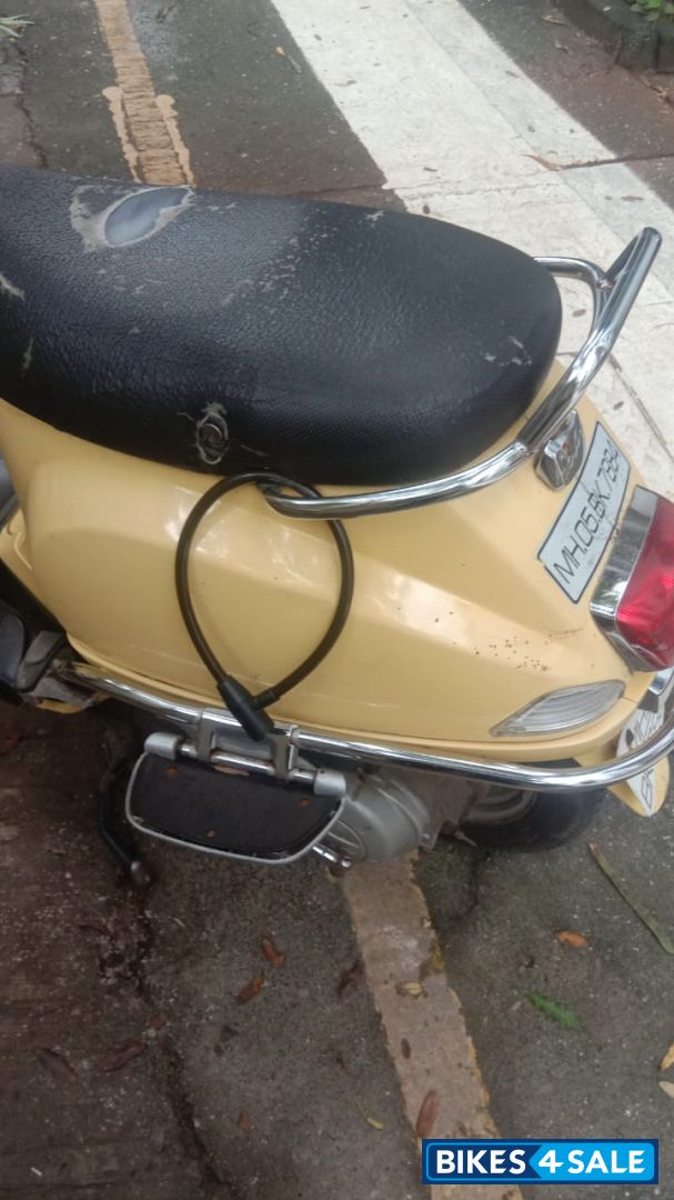 Yellow Vespa 125