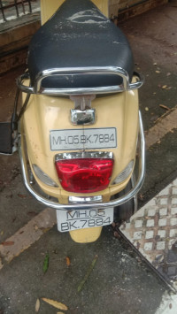 Yellow Vespa 125