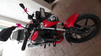 Striking Red TVS Raider 125