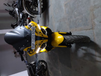 Yellow Bajaj Pulsar RS 200