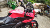 Red Bajaj Pulsar AS 150
