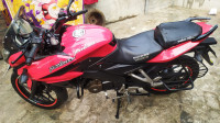 Red Bajaj Pulsar AS 150