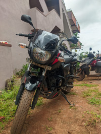 Black And Red Bajaj Pulsar 150 Twin Disc