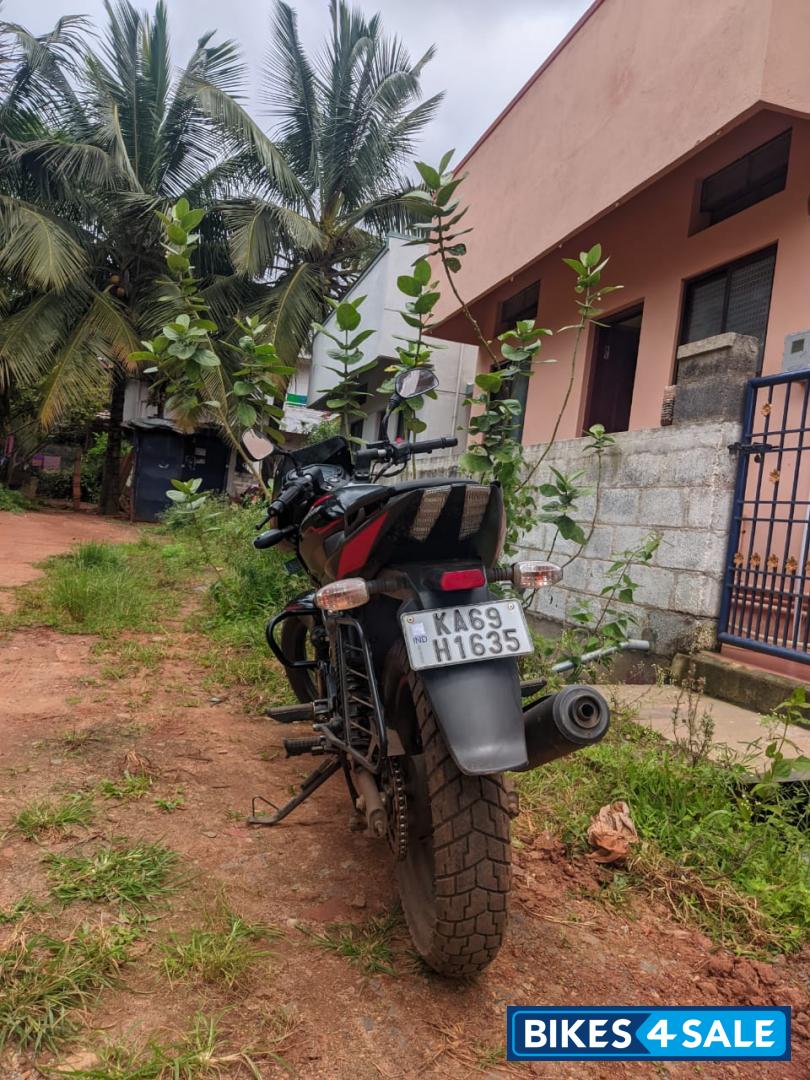 Black And Red Bajaj Pulsar 150 Twin Disc