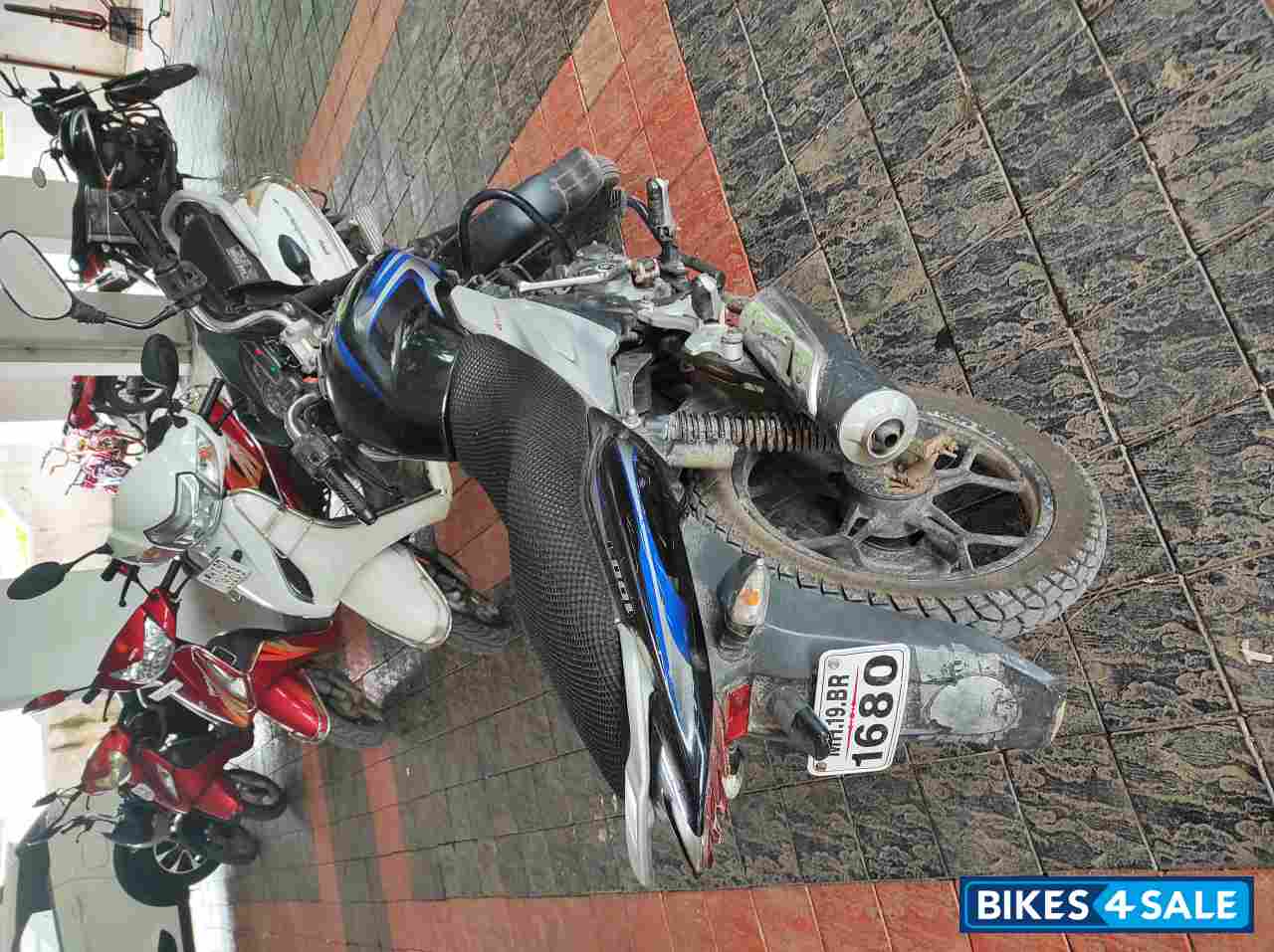 Wine Red Bajaj Discover 100T