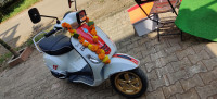 White Vespa SXL 125 BS6