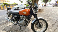 Orange Royal Enfield Interceptor 650 Twin