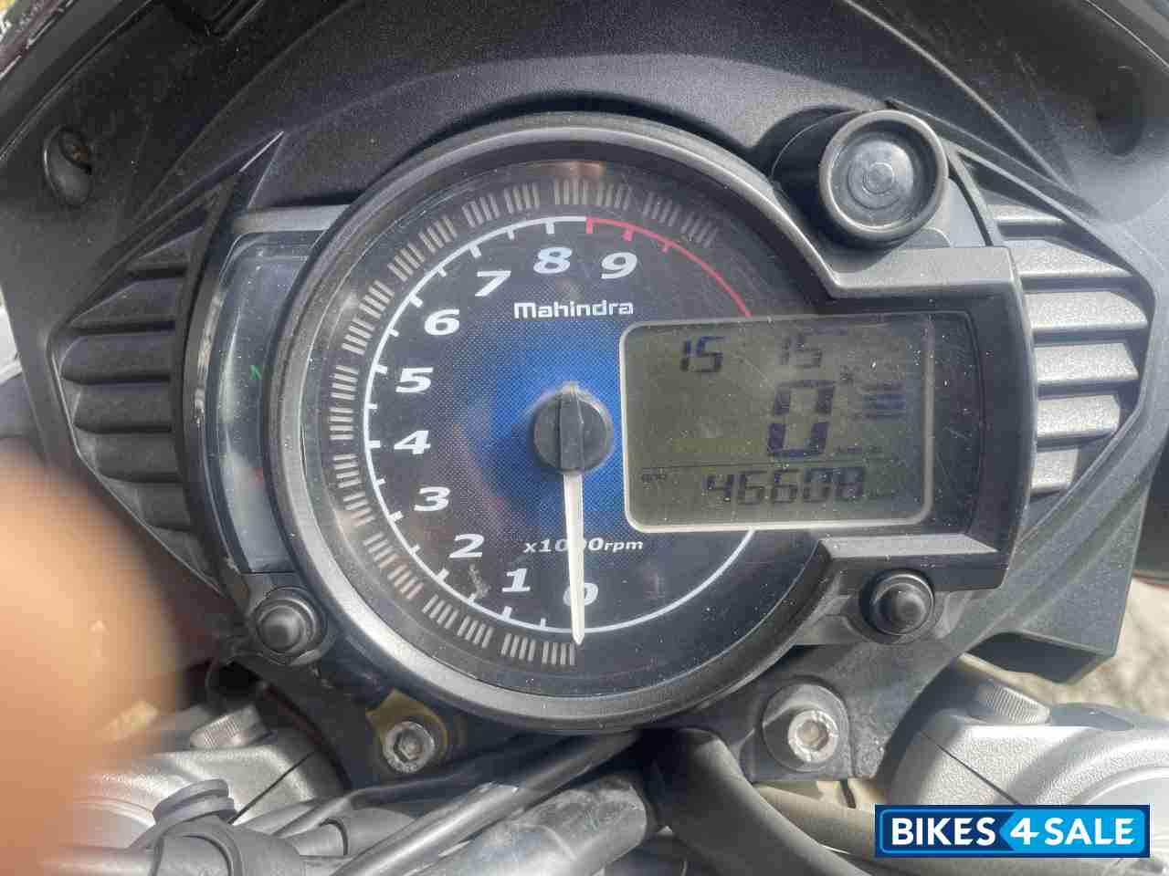 Red And White Mahindra Mojo UT 300