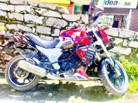 Red And White Mahindra Mojo UT 300
