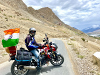 Red And White Mahindra Mojo UT 300