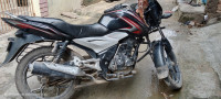 B Maroon Bajaj Discover 100T