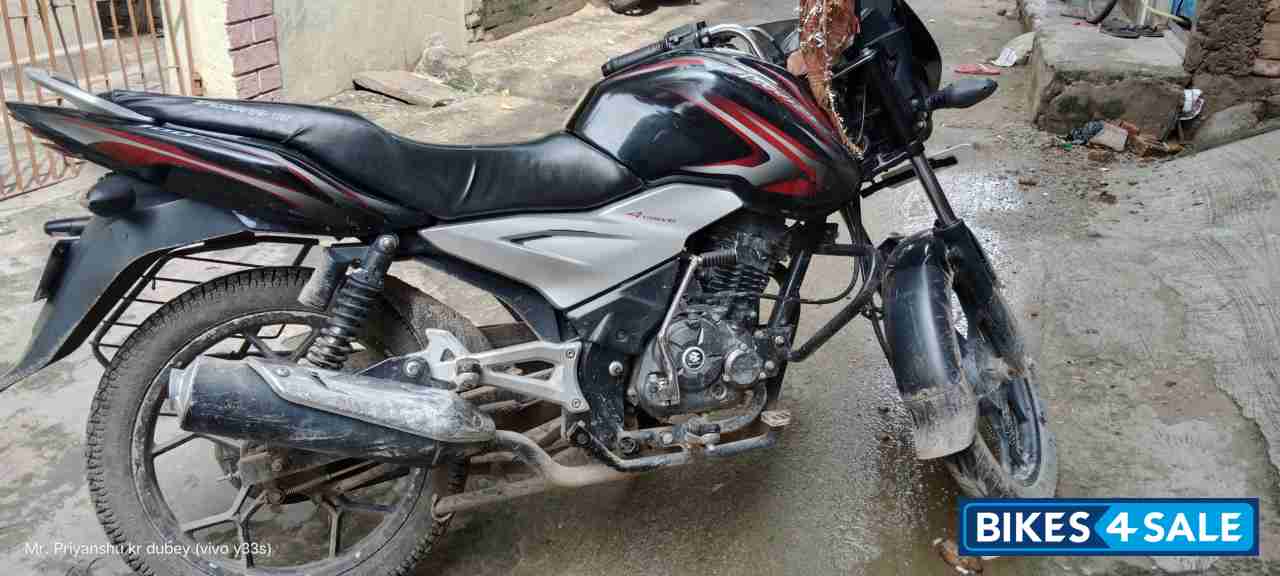 B Maroon Bajaj Discover 100T