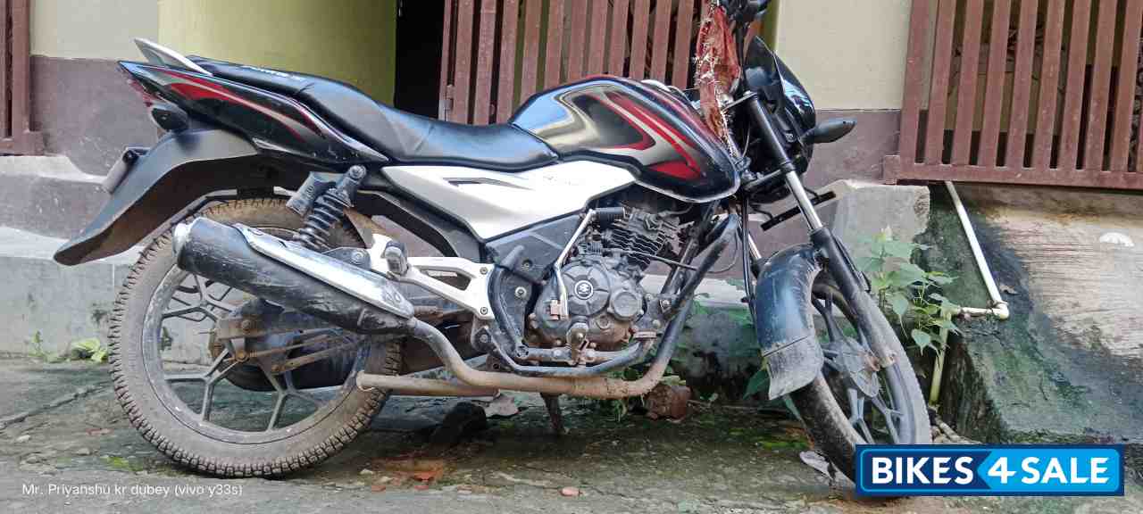 B Maroon Bajaj Discover 100T