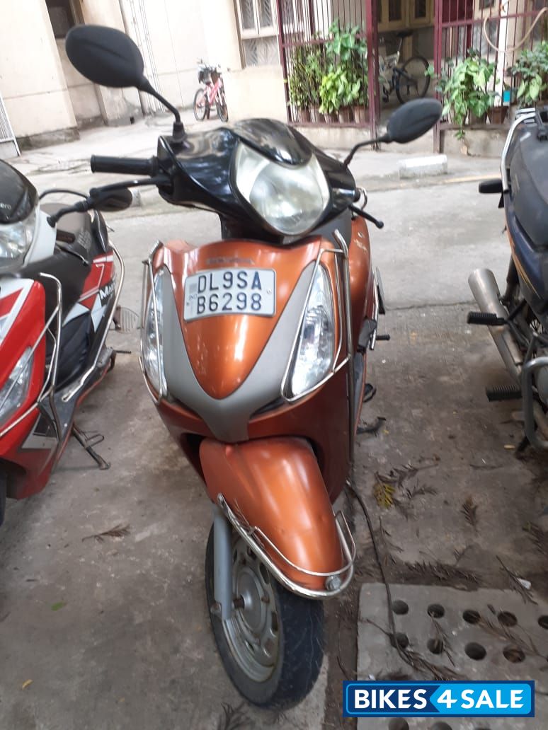 Orange Honda Aviator