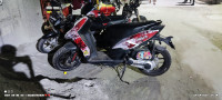 White Aprilia SR 150
