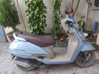 Light Blue , Beige And Maroon  TVS Jupiter Grande