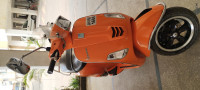 Orange Vespa SXL 150 FL 20
