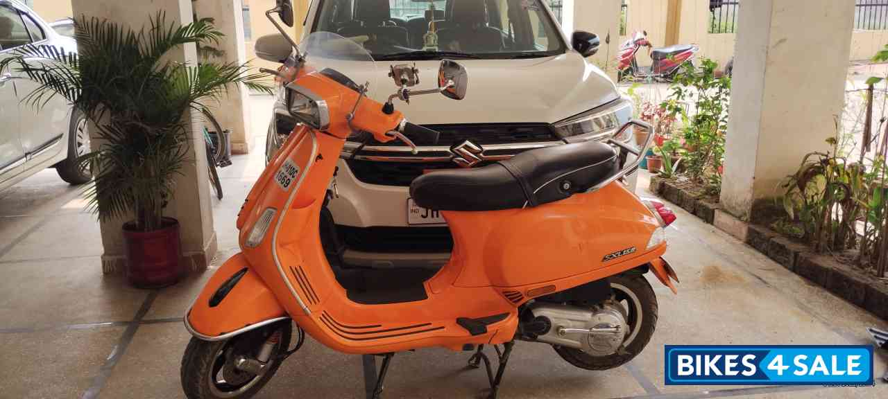 Orange Vespa SXL 150 FL 20