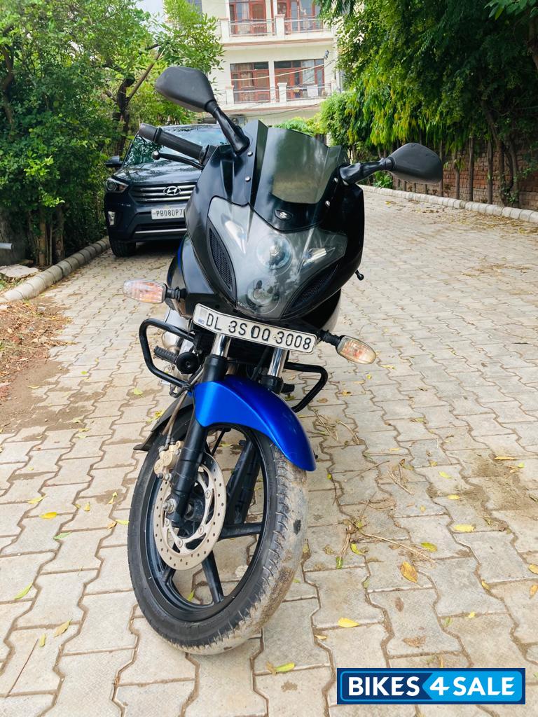 Blue And Black Bajaj Pulsar 220 DTSi