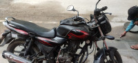 Red Bajaj Discover 150