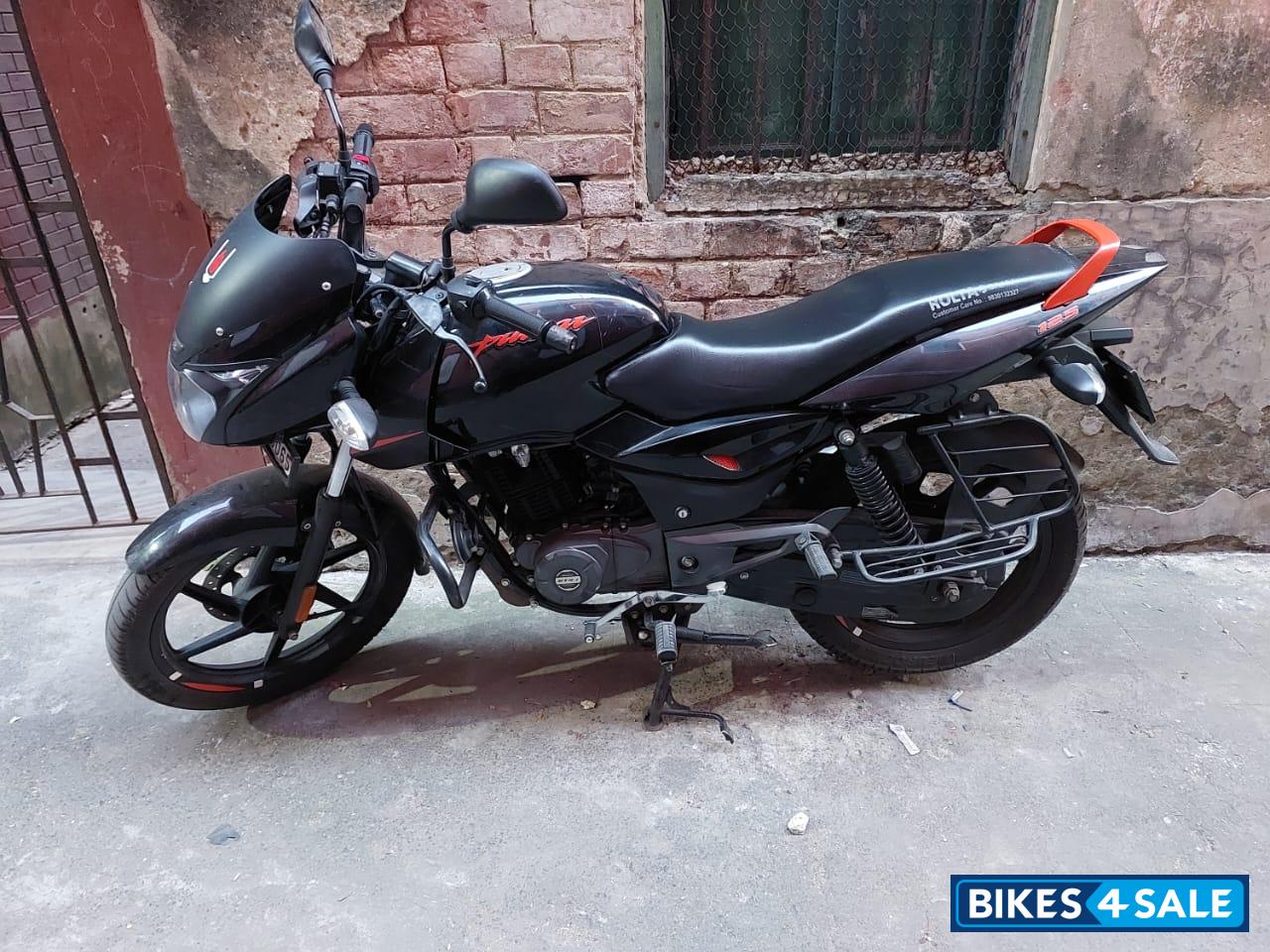 Ebony Black Solar Red Bajaj Pulsar 125 Neon BS6