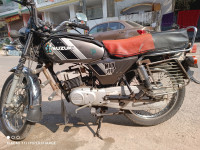 Grey Suzuki MAX 100