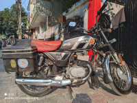 Grey Suzuki MAX 100