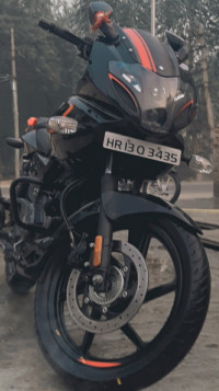 Red/black Bajaj Pulsar 180F Neon