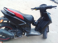Black Aprilia SR 150