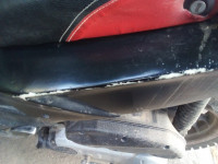 Black Aprilia SR 150