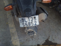 Black Aprilia SR 150