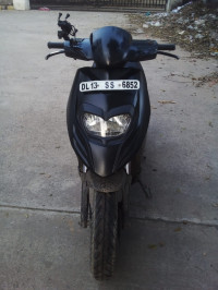 Black Aprilia SR 150