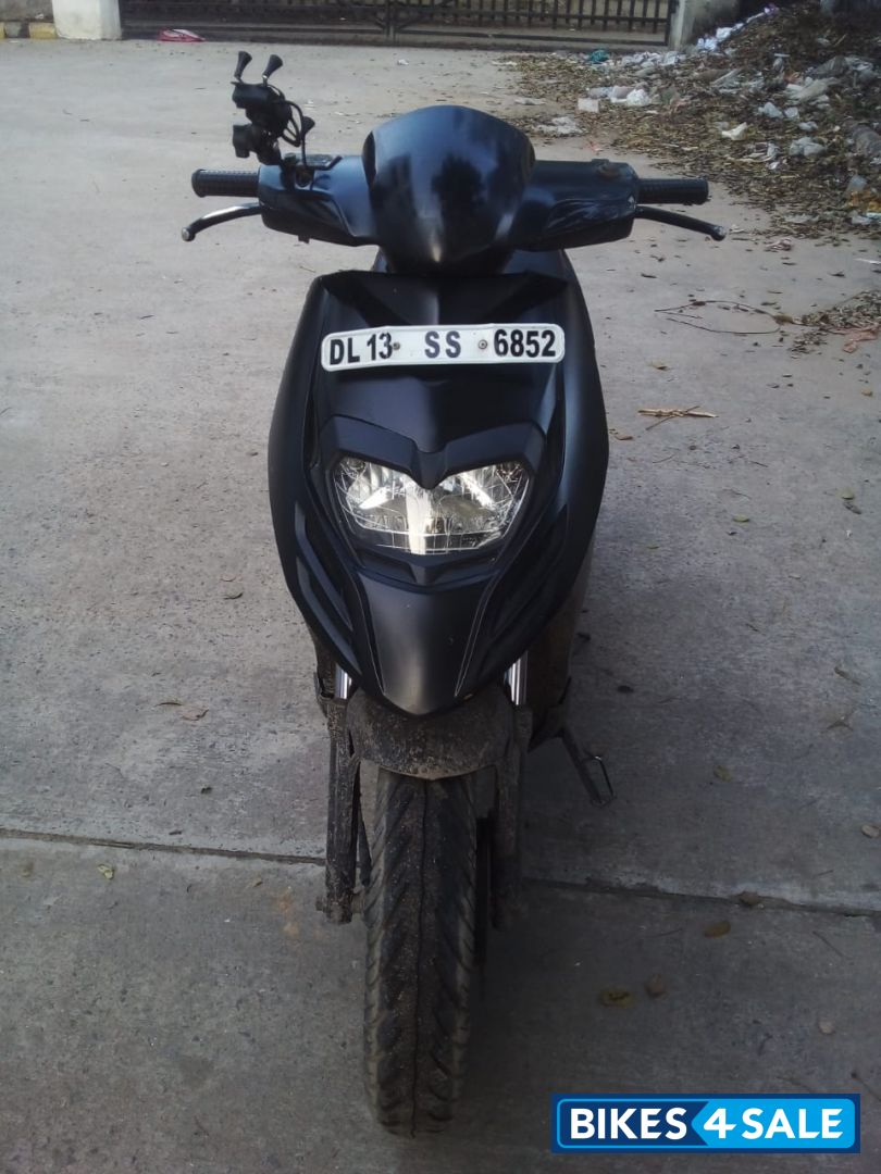 Black Aprilia SR 150