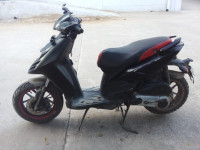 Black Aprilia SR 150