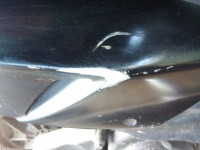 Black Aprilia SR 150