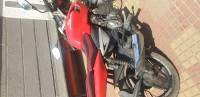 Red Bajaj Pulsar 135LS