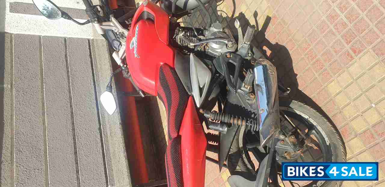 Red Bajaj Pulsar 135LS