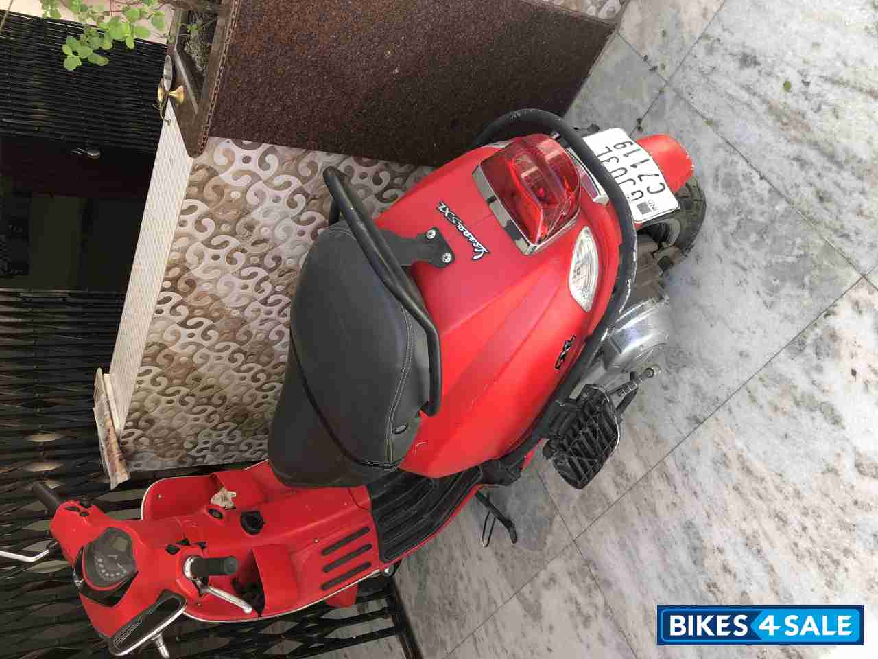 Red Vespa SXL 125 BS6