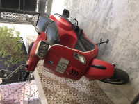 Red Vespa SXL 125 BS6