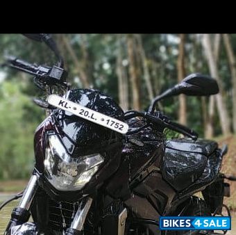 Plum Red Bajaj Dominar 400 ABS