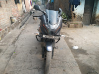 Matte Black And Neon Orange Bajaj Pulsar 180