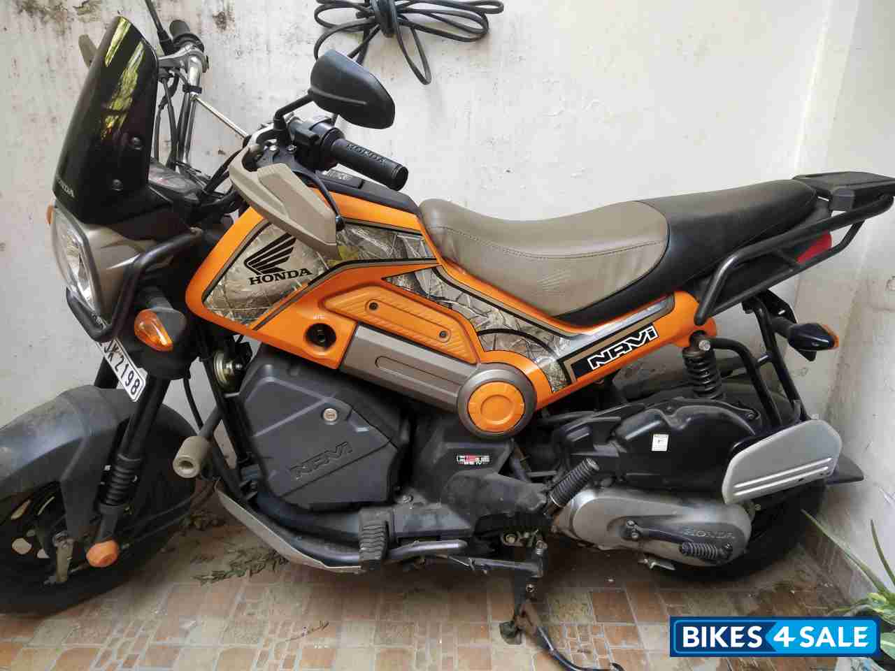 Sparky Orange Honda Navi Adventure
