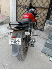 Red Bajaj Pulsar 150