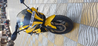 Yellow Bajaj Pulsar RS 200 ABS